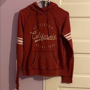 A burgundy Hollister sweater